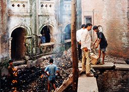 Bhojan Griha buildings deteriorated by garbage and vegetation growth before renovation